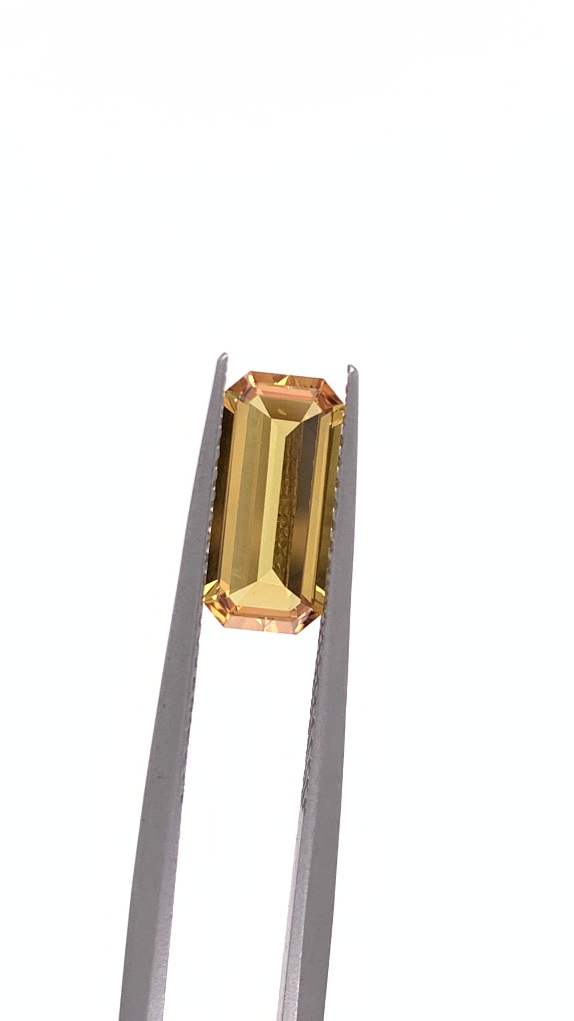 Orange Sapphire — 1.56ct Emerald Cut | 10.60 x 4.95mm | Australia | Unheated