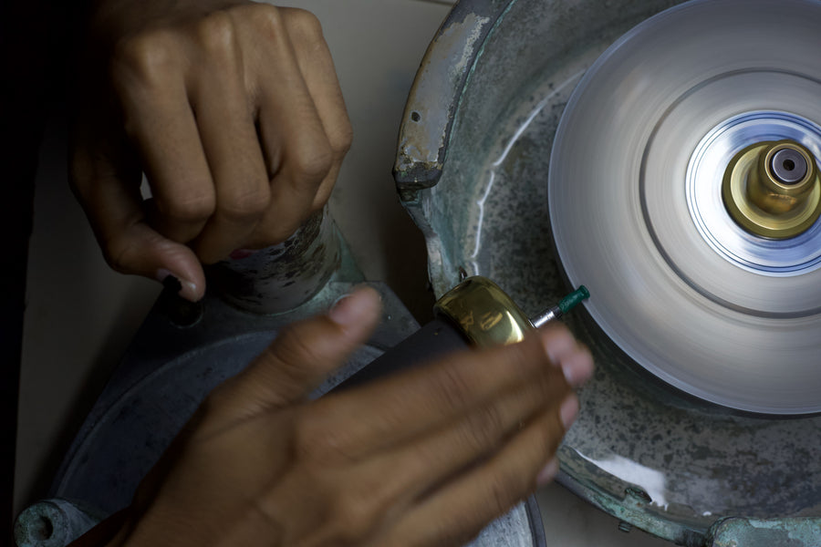 Calibrating the stones for precise shape and size, a critical step in every order
