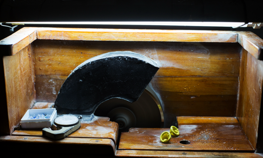 The preforming machine, the first stage in shaping a rough stone.