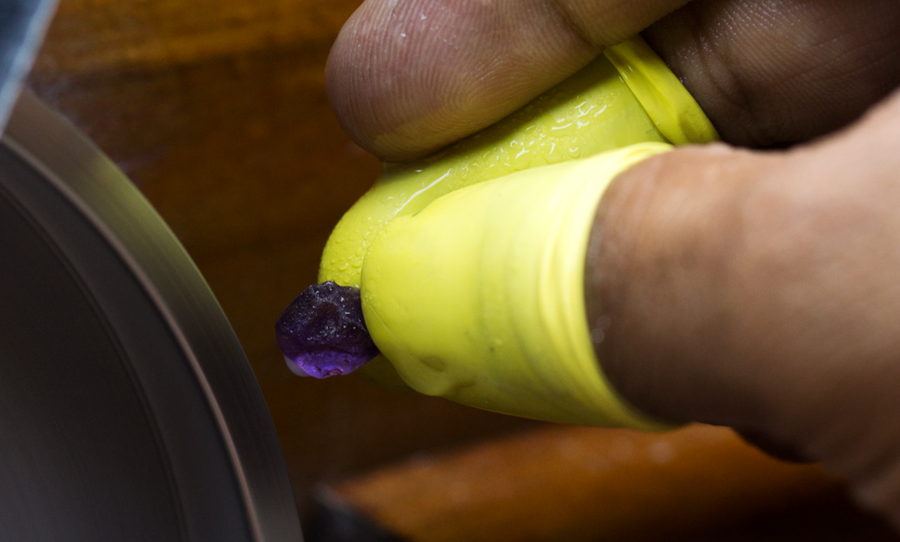 Preforming a sapphire. The intended shape is planned in advance, but confirmed only after inclusions, cracks and impurities have been worked out of the stone.