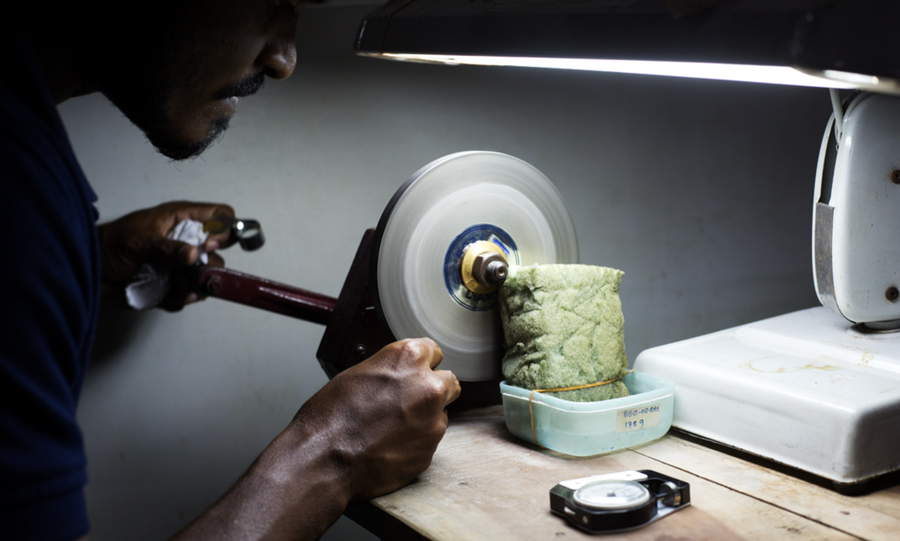 A handheld shaper, an alternative preforming tool used to work the rough stone before cutting